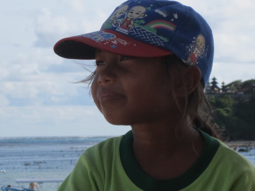 Child seller on Geger Beach