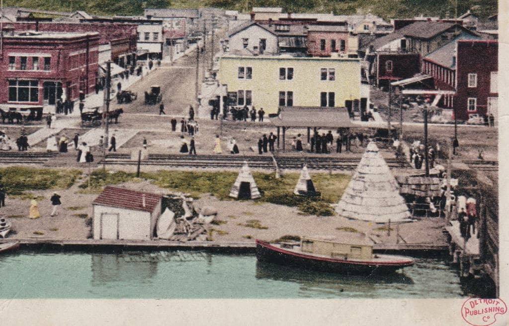 NW Harbor Springs MI 1910 Wonderful Waterfront View from the Steamer Ferry Docks GR&I Dummy Train at DEPOT Next TO THE NEW YORK BUILDING Native Americans still living on the Harbor Beach IN TEEPEES2