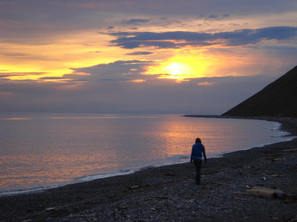 girl watches sunset @ Ebey's Landing