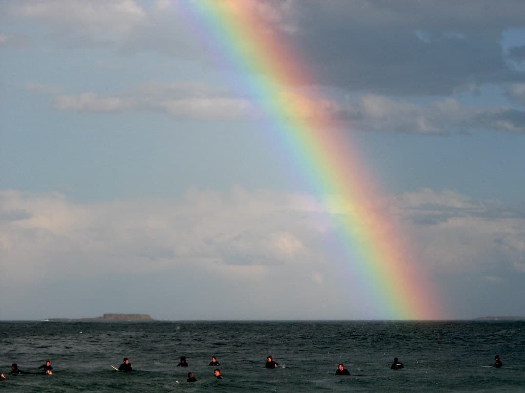 Surfers don't mind the rain
