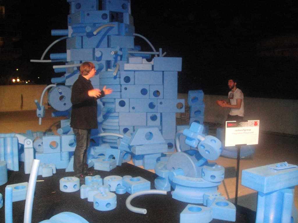 Ben Gulak & Cesar Harada in front of the 2010 TED fellow tower
