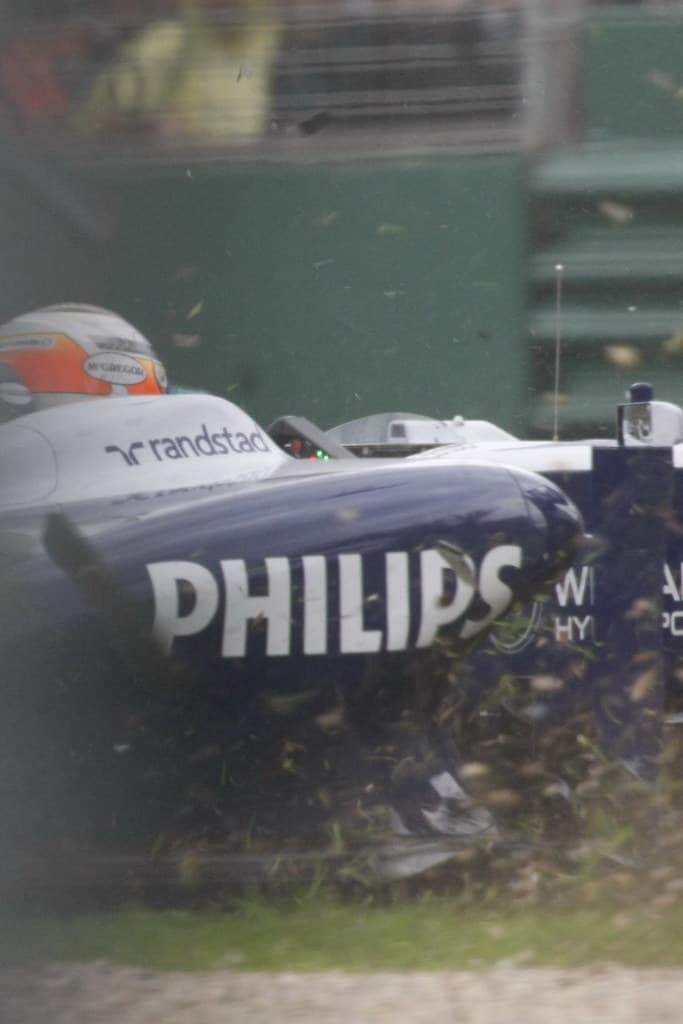 Hulkenberg comes to a halt in the gravel on turn 6
