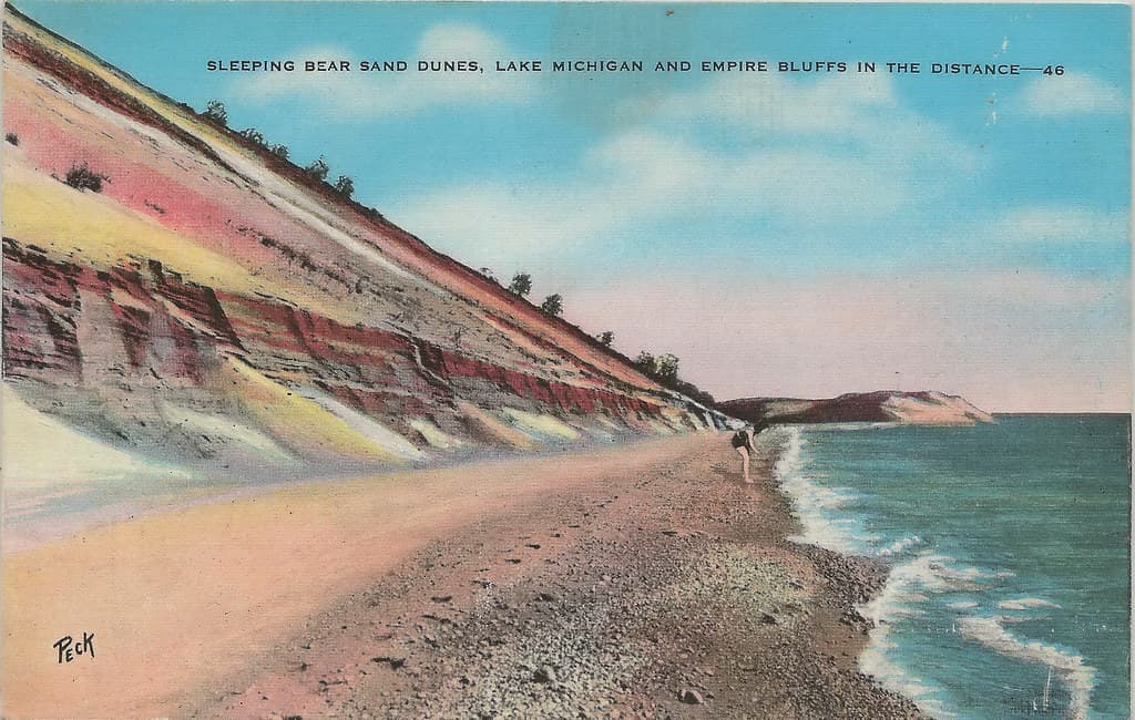 NW Leelanau Glen Haven Empire MI Circa 1920s Young Girl on Beach at Sleeping Bear Dunes Empire Sailors Landmark Empire Bluffs in distance Photographer PECK