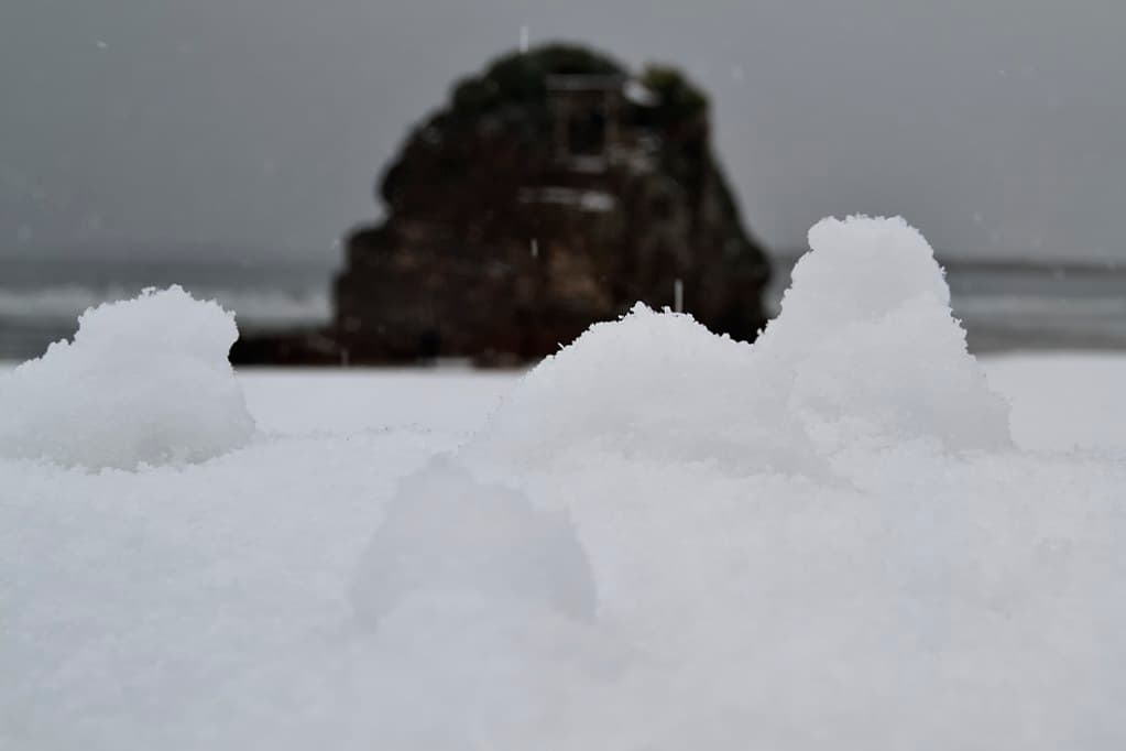 Different view of Inasa Beach and Benten iwa