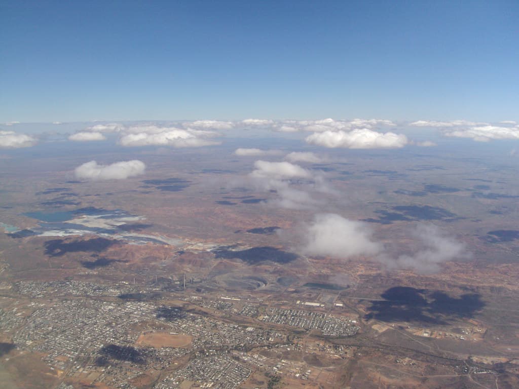Mt Isa from the air. Town and mine and big chimney stack