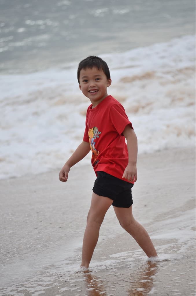 Isaac looks back after a wave