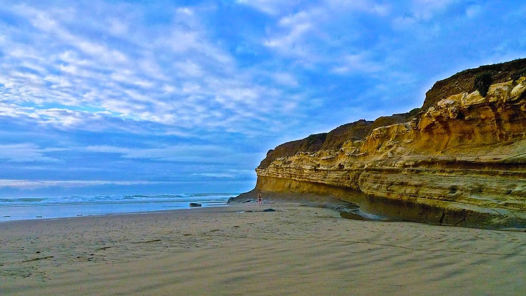 Beach Runner, Cliffs, Approaching Sunset ...
