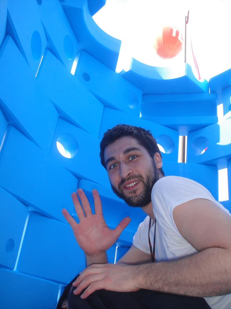 Cesar Harada building the 2010 TED Fellows blue foam tower