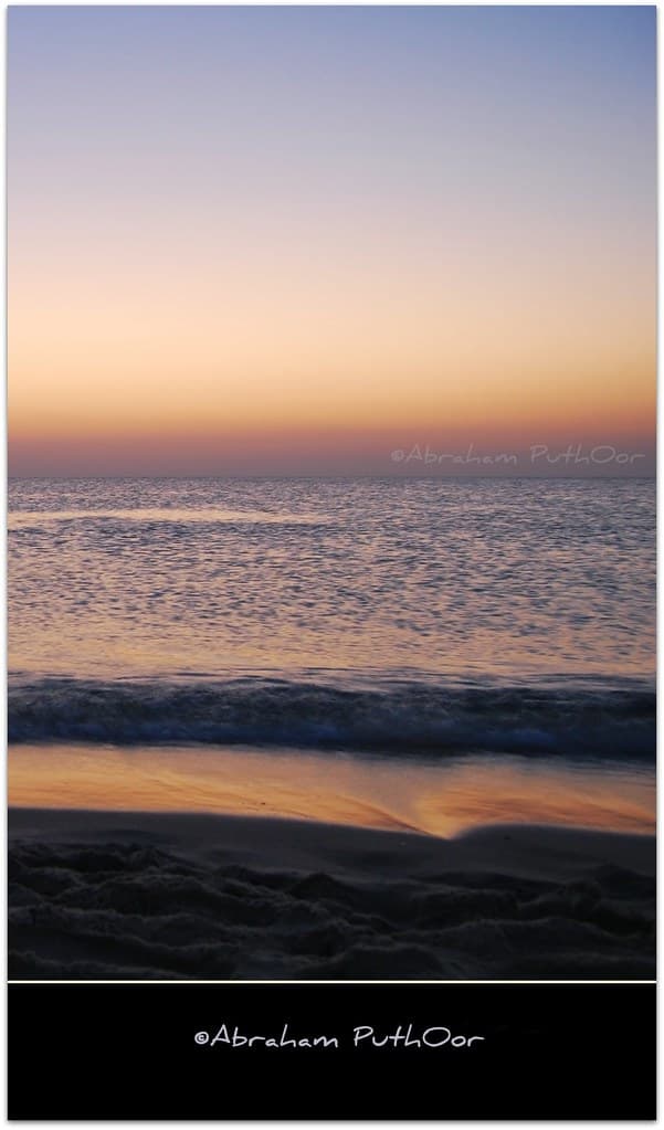The East Is Broken Into Bars Of Orange, Gold, And Gray ~