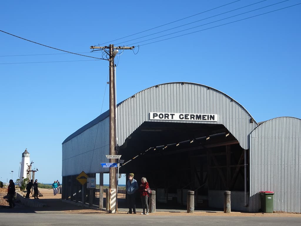 Port Germein. Goods shed at the town end of the longest jetty in the southern hemisphere. First section  of jetty built 1880. Extended 1883 to 1664 metres  of 5459 feet long. Became an international port 1884.