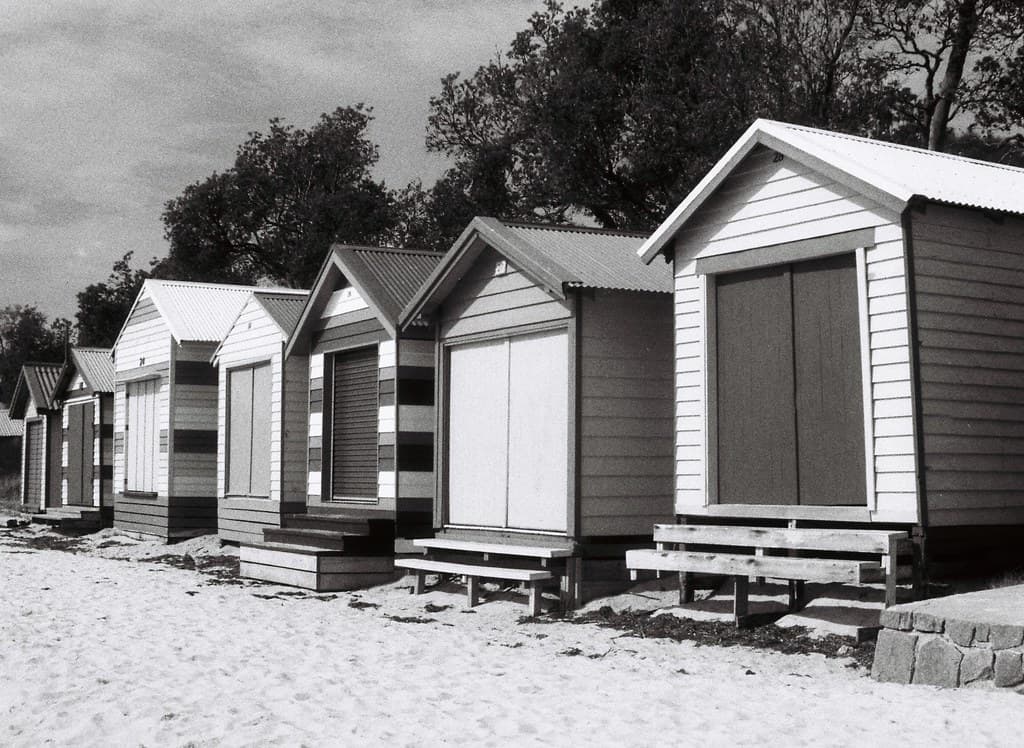 Beach huts in black-and-white