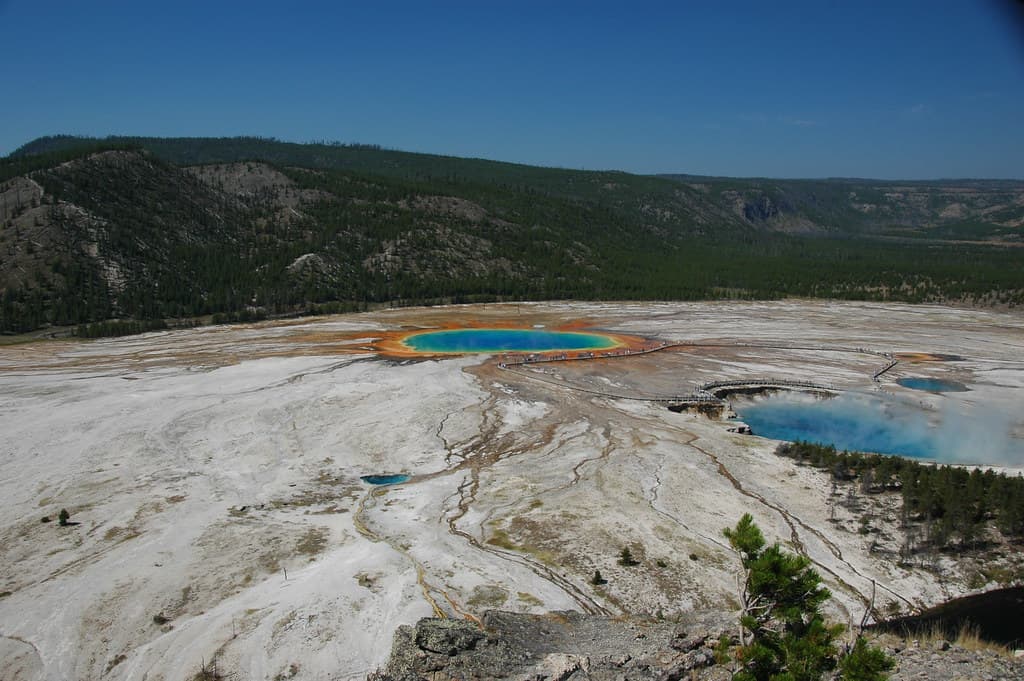 Grand Prismatic Spring (near center) & Indigo Spring (below & left of center) & Excelsior Geyser-Turquoise Pool-Opal Pool (right) (30 August 2011)