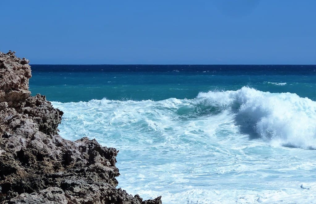 Elliston. Rocks and breaking surf on one of the coastal cliff drives of Elliston.