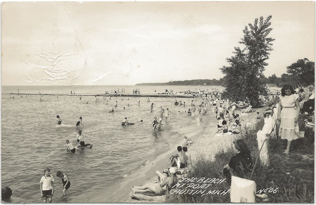 CEN Port Austin MI 1940s RPPC BEACH BABES & Crazy Tourist Jammed Port Austin Harbor & Beach  Swimming Pier near Port Crescent State Park on Lake Huron Photographer Unknown Postmarked 1950