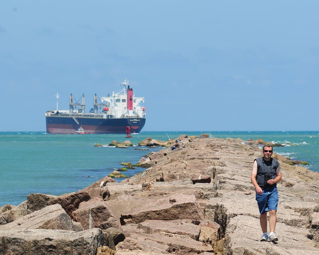 Kevin on breakwater at Isla Blanca Park, South Padre Island, Texas