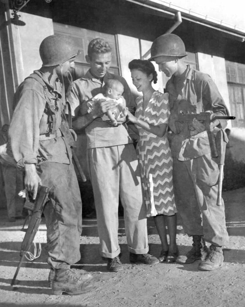 Mr. & Mrs. Hal Bowie and baby daughter Lea.   Los Banos Interment Camp survivors, Laguna, Philippines 1945. (A very important picture. Please read below:)