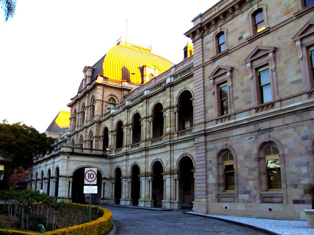 Queensland Parliament House in Brisbane. Built in sections the first 1867 the last 1887. Done in the French Empire style with colannades.