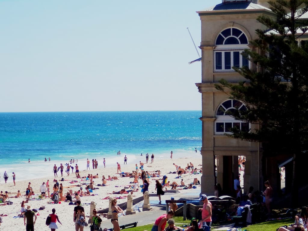 Perth. Cottesloe Beach and the Indian Ocean. Beach goers enjoying the sun. Bikini girls