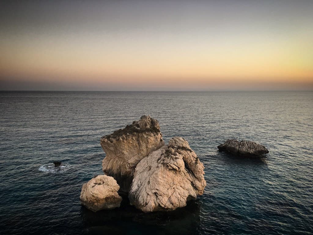 Sunset over the Mediterranean Sea and Petra tou Romiou rocks, Paphos, Cyprus, November 2018