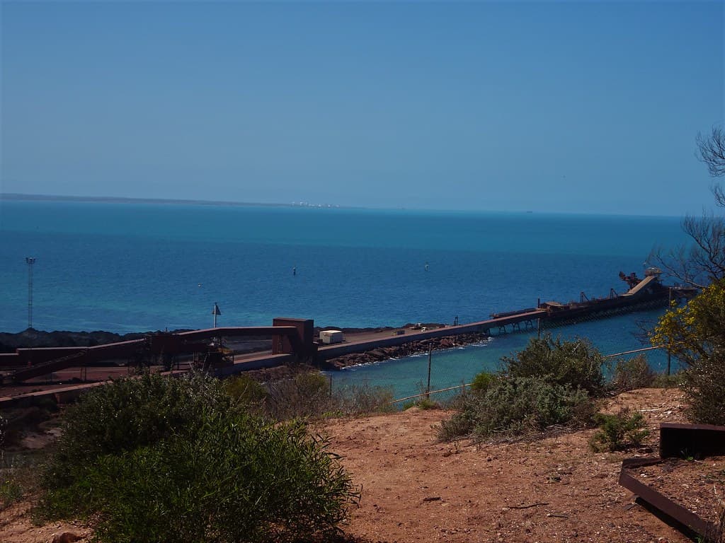 Whyalla. The old iron ore loading jetty at the Whaylla steel works. In the distance the fuel storage tanks at Point Lowly on Specners Gulf.