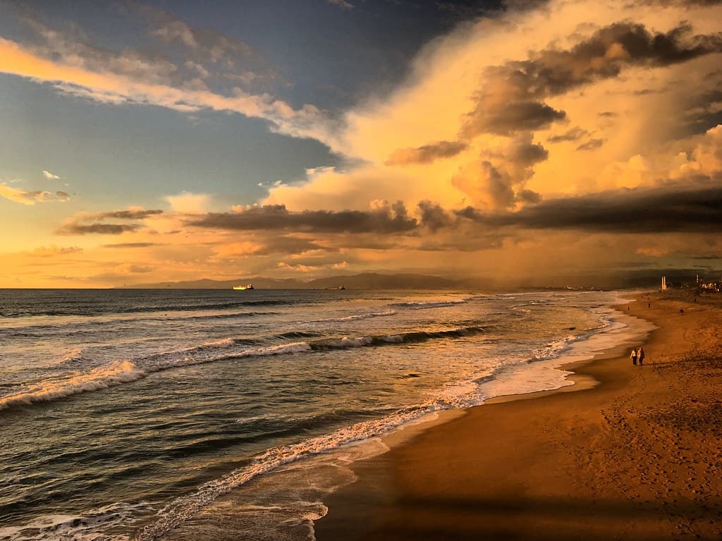 Sunset over the Pacific Ocean with the storm clouds over the Manhattan Beach, California, USA, January 2019