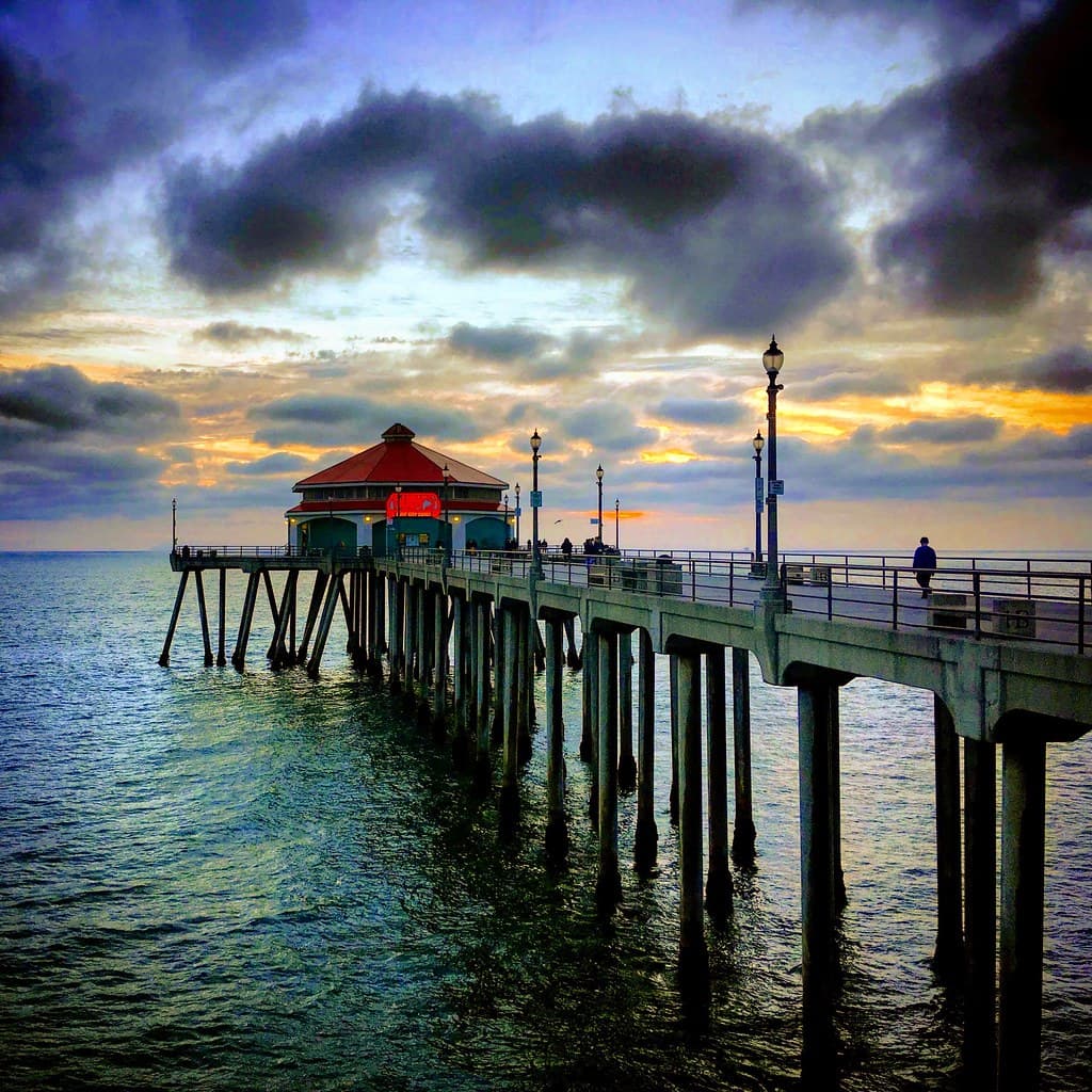 Huntington Beach pier over the Pacific Ocean at the dusk, Huntington Beach, California, USA, January 2019