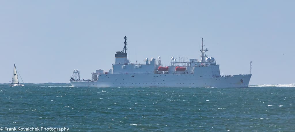 US Navy (?) ship coming into port