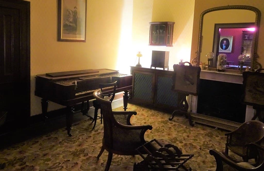Adelaide. Grange Beach. Explorer Captain Charles Sturt built this grand house in 1840. This is the drawing room next to the dining room. Fine grand piano etc..