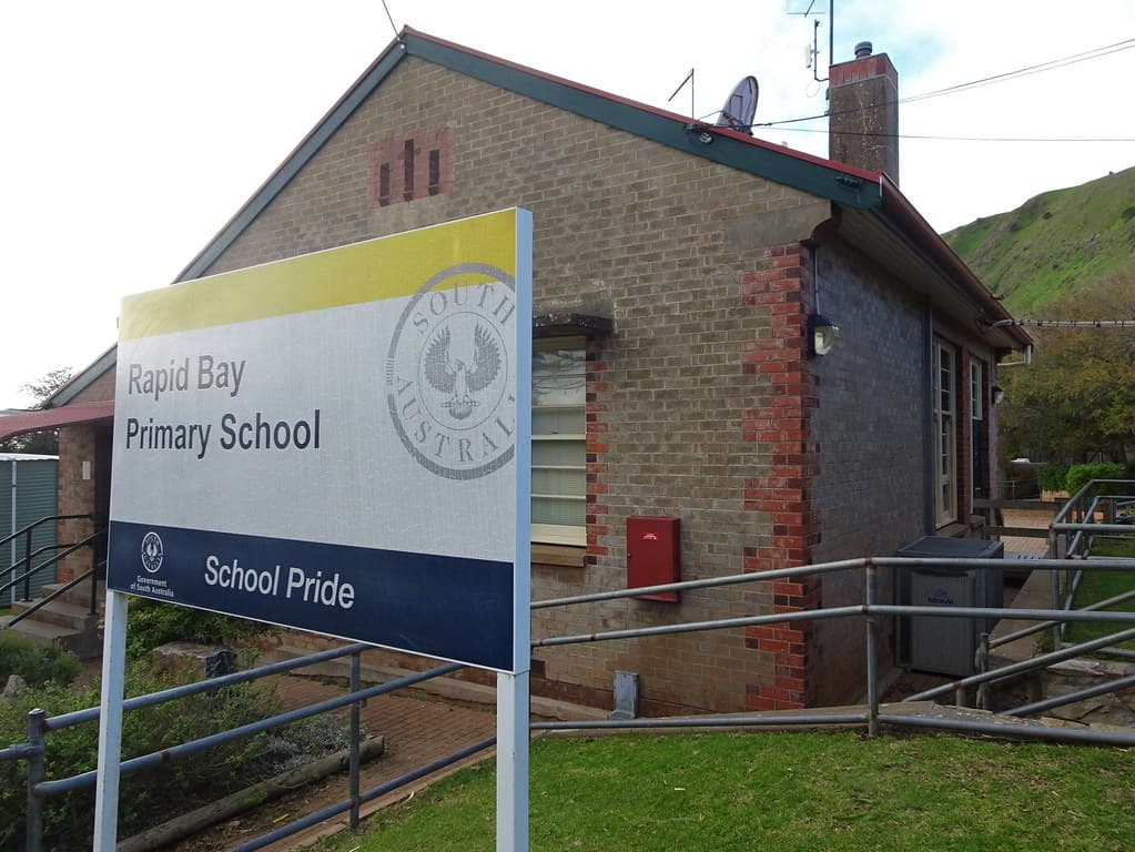 Rapid Bay on Fleurieu Peninsula. This state government school was built to educate children at the BHP mines there which began mining limestone in 1938..
