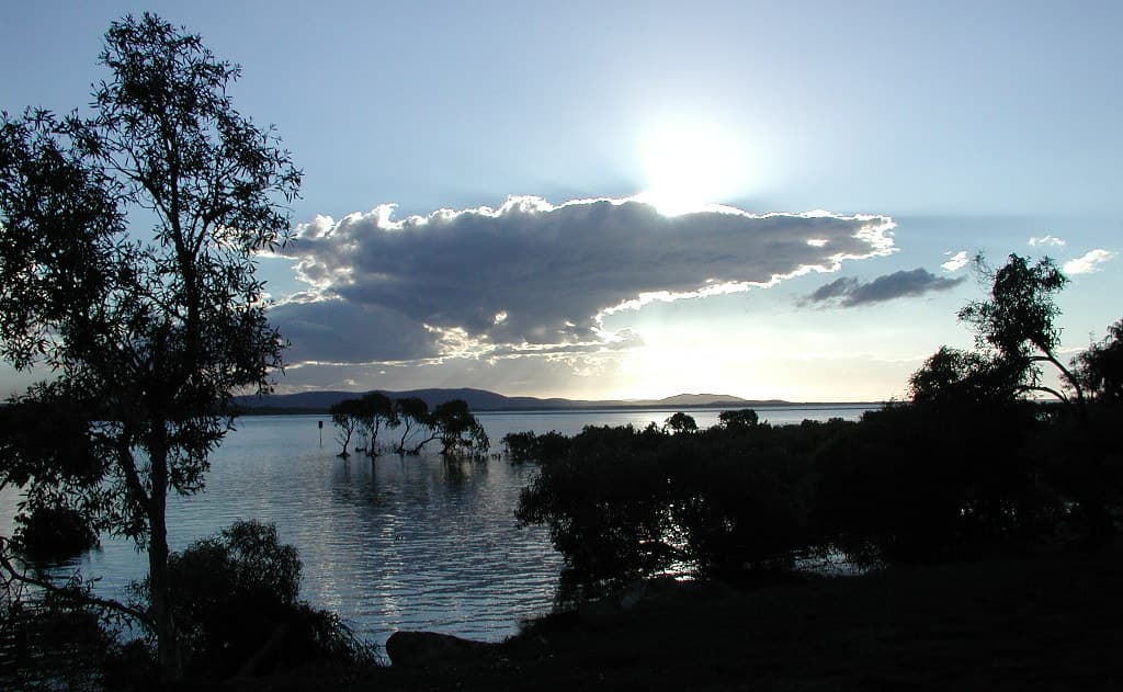 1770 sunset behind a cloud.