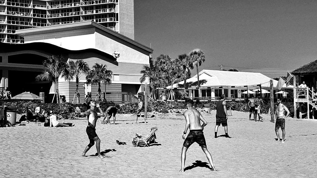 Get it!  Get the ball! - Men on The Beach