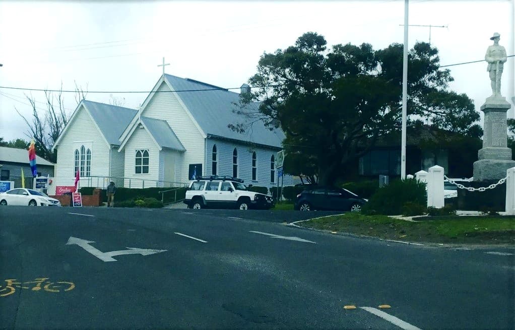 Apollo Bay. Wooden Gothic church on the Great Ocean Road and the town's War Memorial.