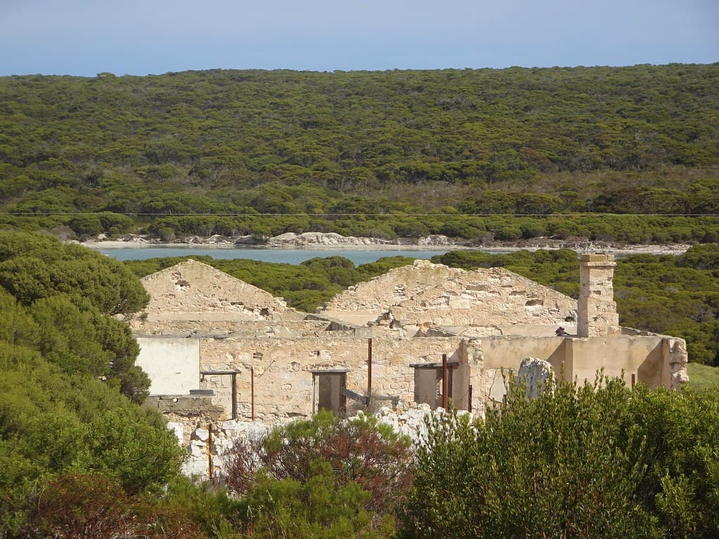 Inneston. Old gypsum mining town. They mined Lake Inneston seen in photo.  Gypsum mined 1913 to 1930. Town of Inneston is now a ghost town. Visible the ruins of the general store. Town closed 1930. Now Innes National Park .