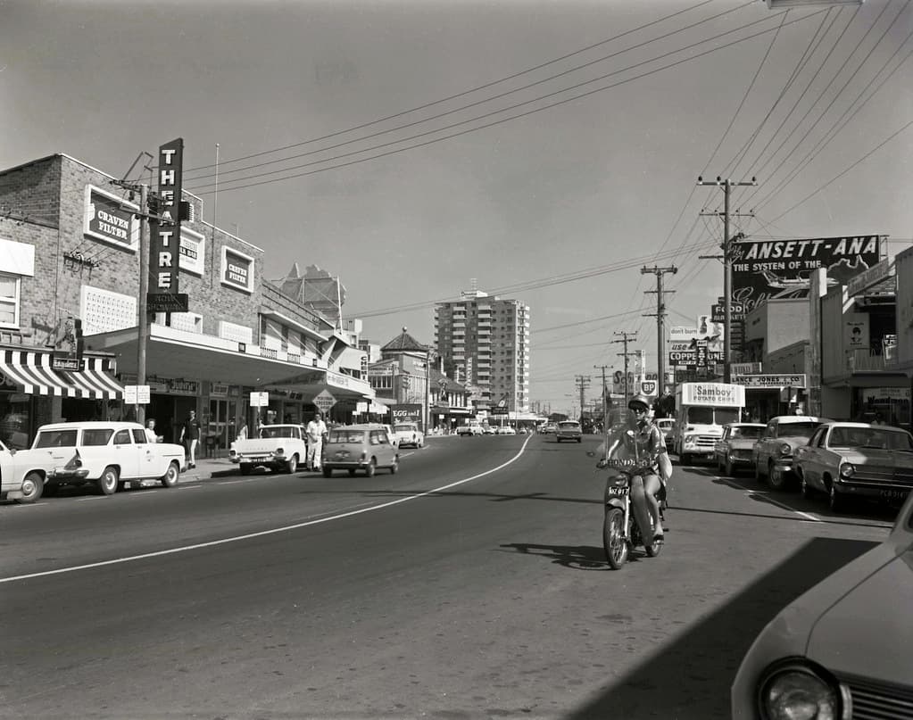 Main Street Surfers Paradise. Meter maid on motorbike Pacific Highway No.13504, 1966
