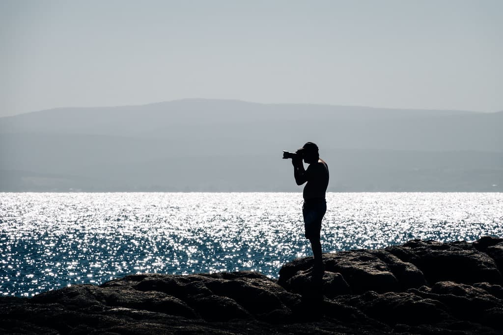 Beach photographer, Honeymoon Bay, Freycinet National Park, Tasmania
