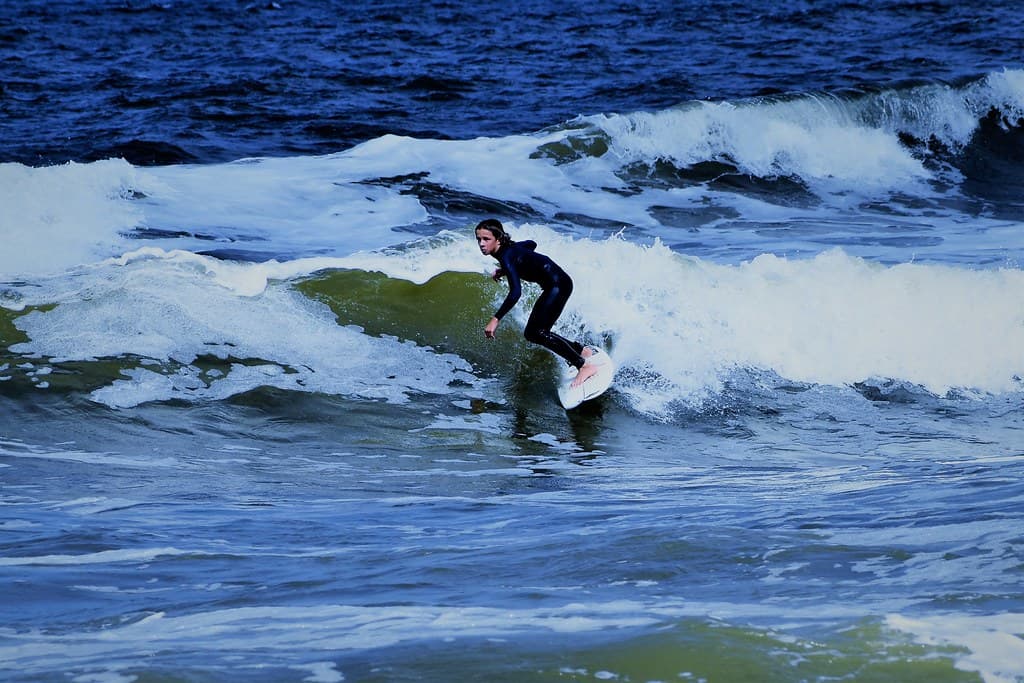young surfer at Birubi Beach Australia