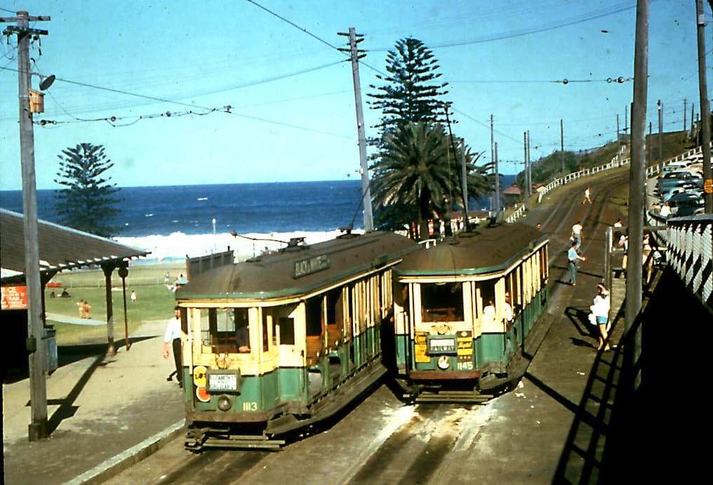 I.D. 1145 probaly photographed by John Alfred on 1955-10-29 & in the John Burgess collection. O class trams 1113 and 1145 side by side at terminus and end of line at Bronte Beach, Sydney, N.S.W., Australia.