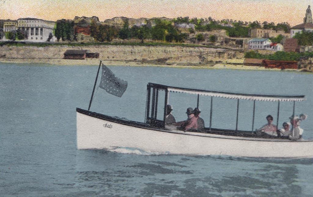NW Petoskey MI 1908 MOTOR LAUNCH pleasure boat LOLA off shore on Little Traverse Bay. The H. O. Rose Lime Works on the beach below the and the Arlington Hotel are featured with the City on the right2