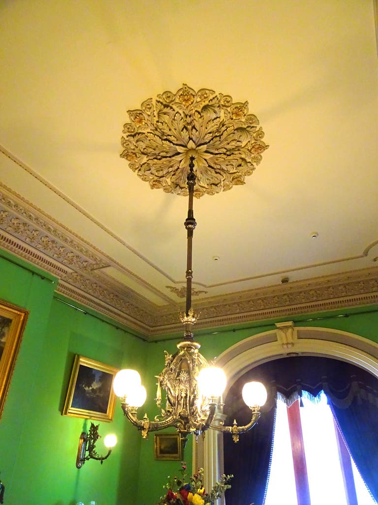 Werribee. Dining room chandelier and ceiling rose in Werribee Park mansion built in 1875 for the Chirnside brothers.