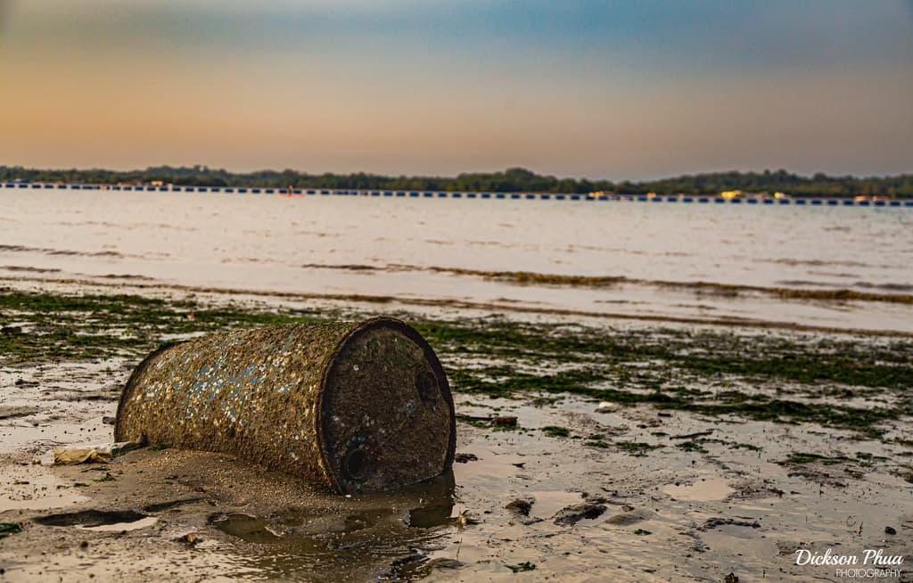 Forgotten barrel in the tidal sand