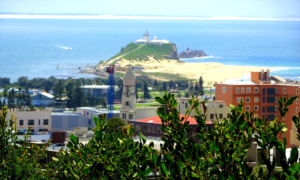 Newcastle. View from the Obelisk built in 1850. The  T & G Insurance building is seven stories high in the Main Street. Beyond is Nobbys lighthouse.