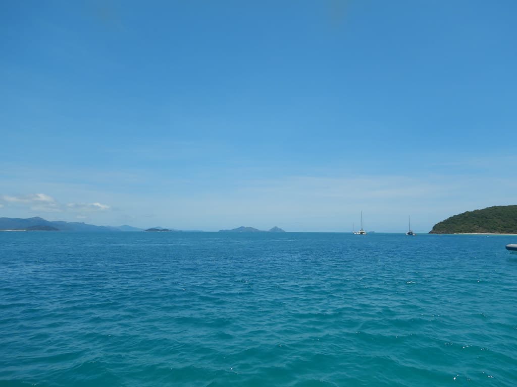 Whitehaven Beach and Whitsunday Island from Chalkies Beach on Haslewood Island