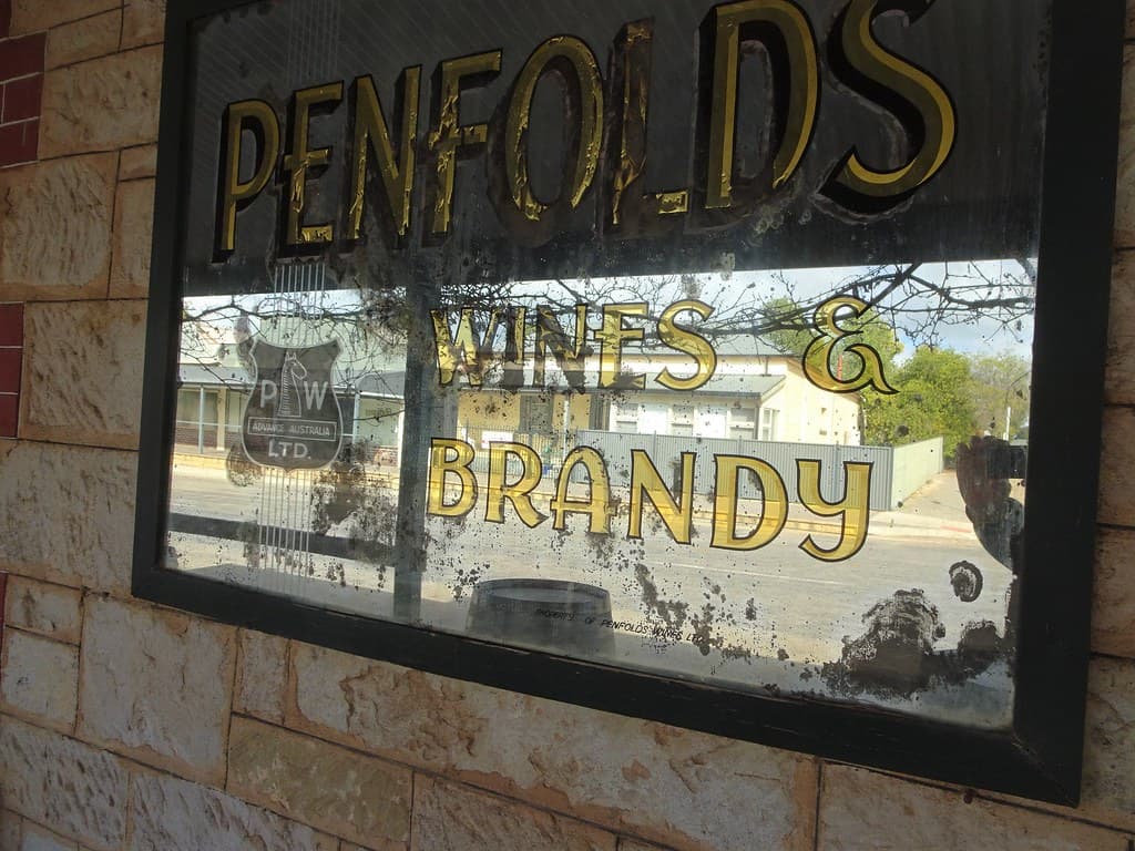 Spalding. On the main street frontage of the 1914 built  Spalding Hotel is a Penfolds advertising mirror of this era for wines and brandy. .