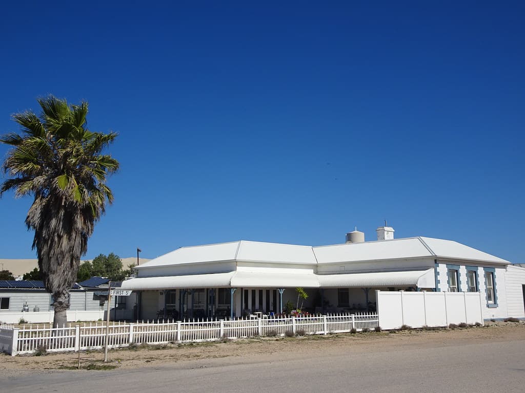 Fowlers Bay Eyre Peninsula. This stone police station was built in 1883. In 1912 a Courtroom was added on the side street with the three large windows. It is now a private residence. .