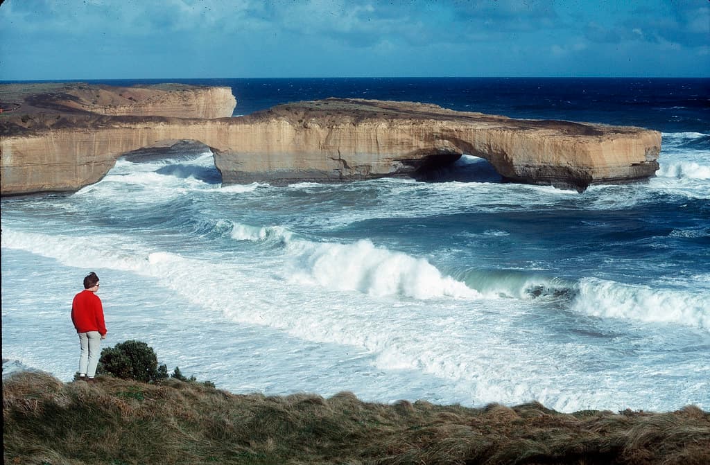 B3R59-127 Seascape with crashing waves with some Kodachrome red & London Bridge VIC along the coast now named London Arch