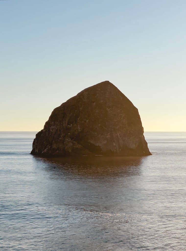 Chief Kiawanda Rock shrouded in late afternoon sun - Pacific City, Oregon