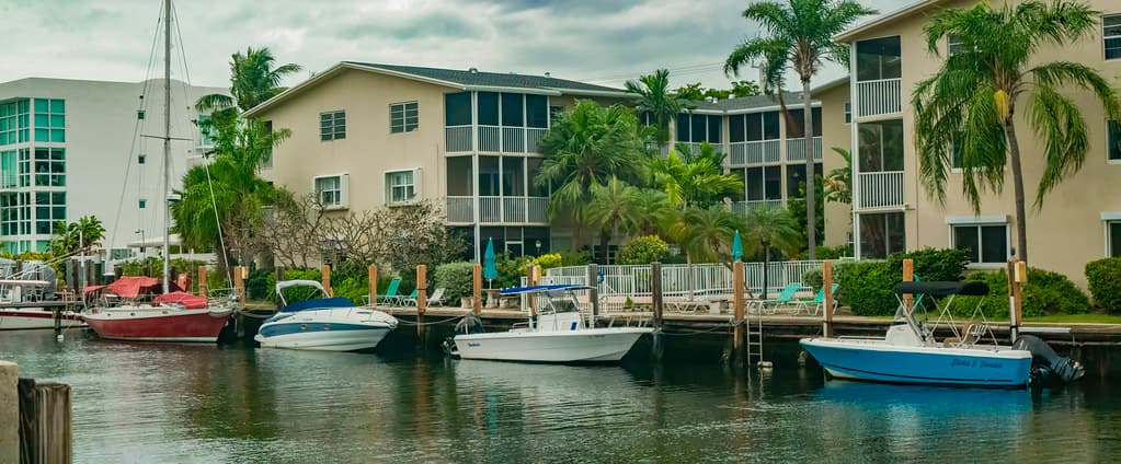 Driving through Las Olas boulevard from the beach to the city center. Views of canals, boats, yachts and architecture of Nurmi Isles neighbourhood of Fort Lauderdale, Florida, USA. Winter trip 2024/25