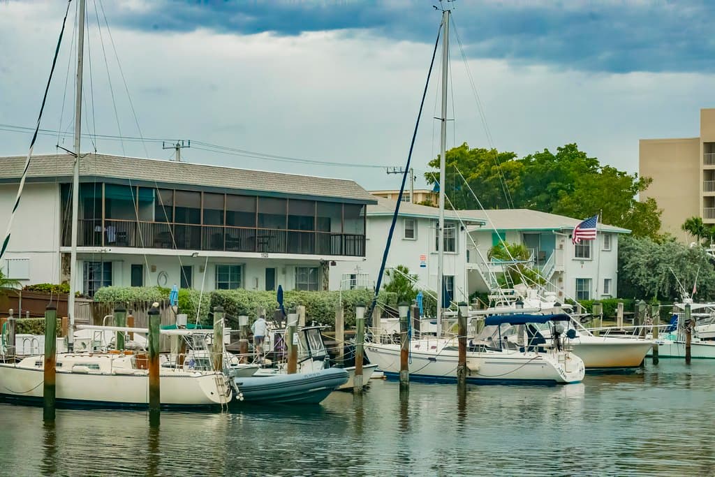 Driving through Las Olas boulevard from the beach to the city center. Views of canals, boats, yachts and architecture of Nurmi Isles neighbourhood of Fort Lauderdale, Florida, USA. Winter trip 2024/25