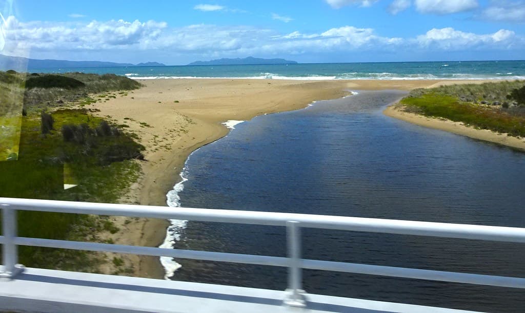 Tasmanian East Coast. Windswept view of the Freycinet Peninsula from the highway with water inlet.