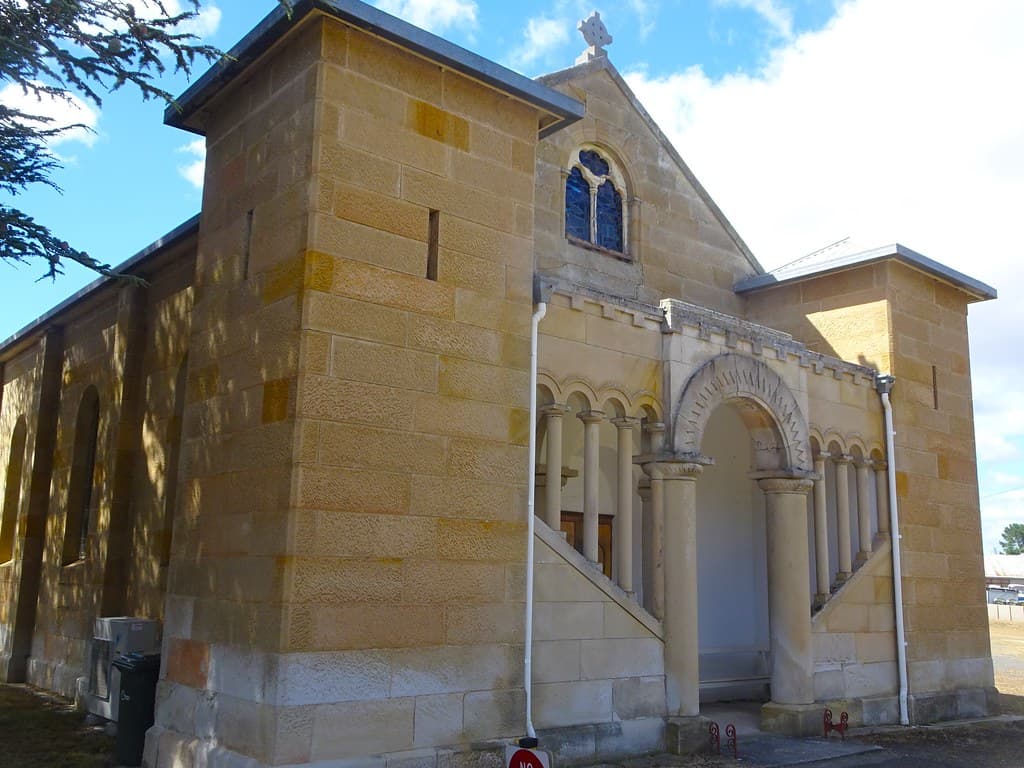 Pontville on the Jordan River.This unique Romanesque sandstone church was designed by James Blackburn in 1839. It was bult by convicts.  Blackburn was transported to VDL in 1833 as a convict.